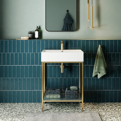 24-inch freestanding bathroom vanity with open shelf and gold metal frame, white rectangular sink.