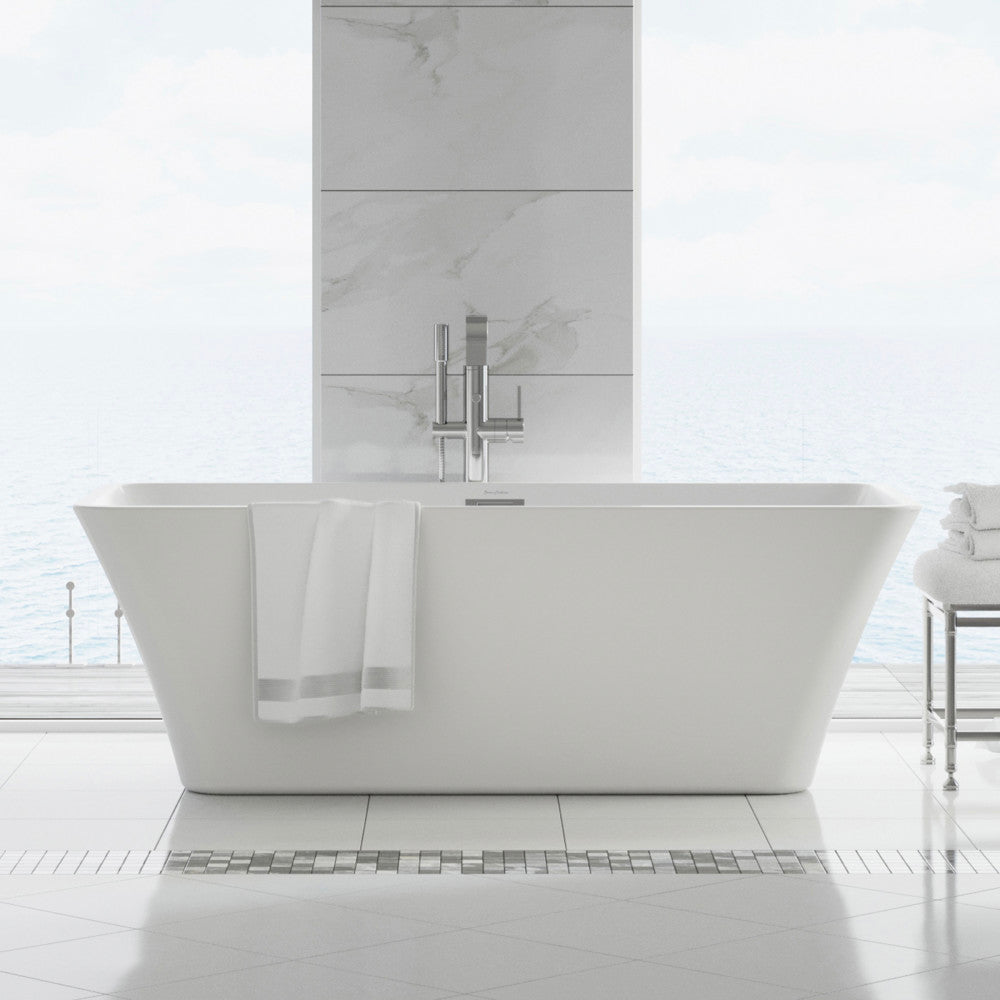 Freestanding soaking bathtub 67 inch in white with center drain and chrome floor-mounted faucet.