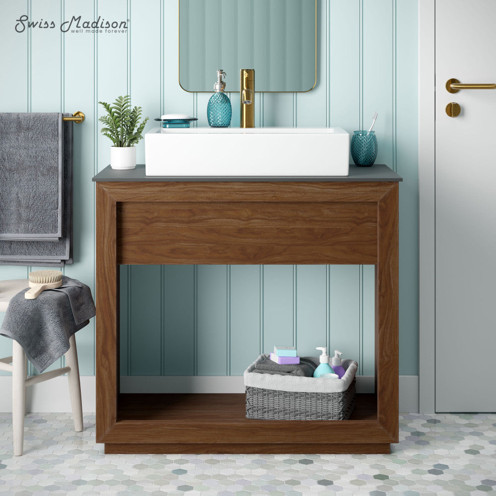 36-inch freestanding bathroom vanity in walnut with slate countertop and single hole vessel sink.