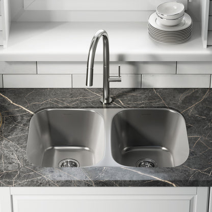 29x18 inch stainless steel undermount kitchen sink with dual basins and modern curved edges.