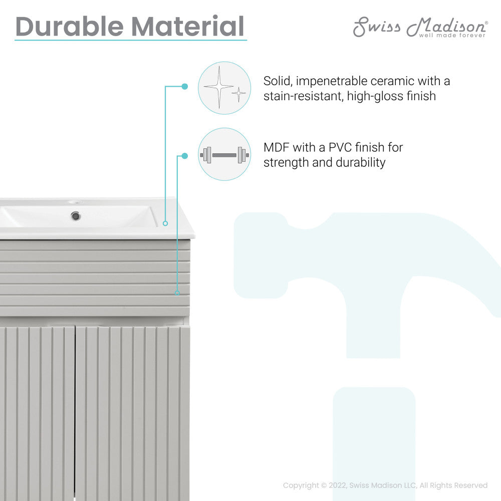 24-inch freestanding bathroom vanity in shell color, single sink, soft-close doors with vertical grooves.