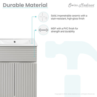 24-inch freestanding bathroom vanity in shell color, single sink, soft-close doors with vertical grooves.