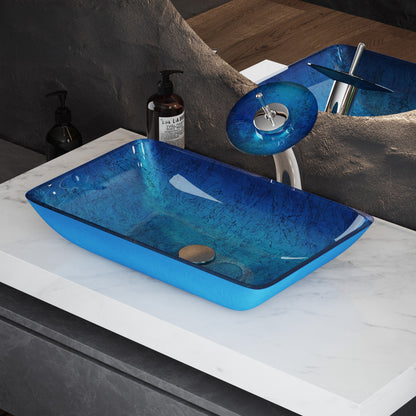 Rectangular glass vessel sink in ocean blue with single-handle chrome faucet, contemporary style bathroom sink.