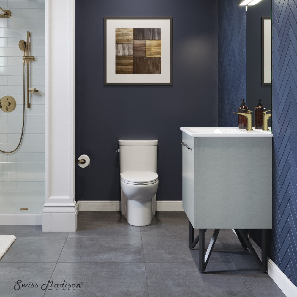 24-inch freestanding bathroom vanity in gray with single sink and black metal legs.