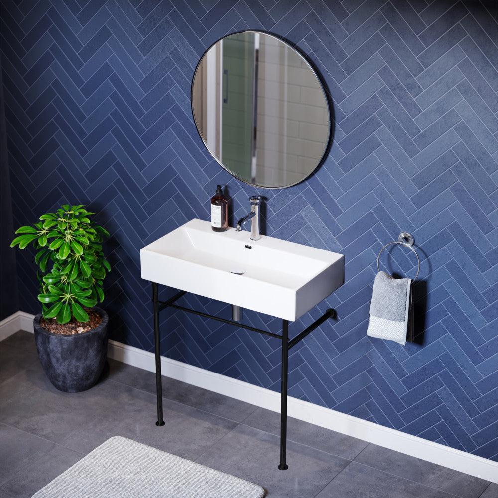 White rectangular console sink with black metal legs and single-hole faucet mount.