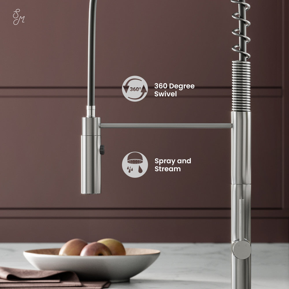 Pull-down single handle kitchen faucet in brushed nickel with spring coil neck and spray/stream function.