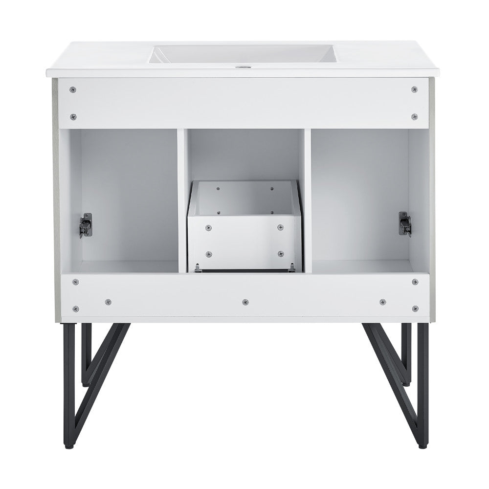 36-inch freestanding bathroom vanity in gray, single sink, soft-close doors, metal legs.