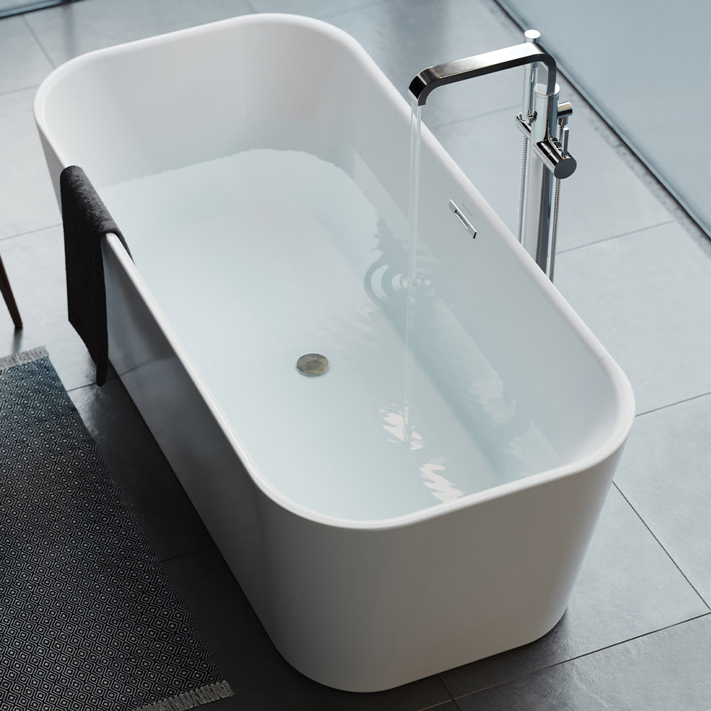 Freestanding soaking bathtub 67 inch, white acrylic, center drain, modern rectangular design.