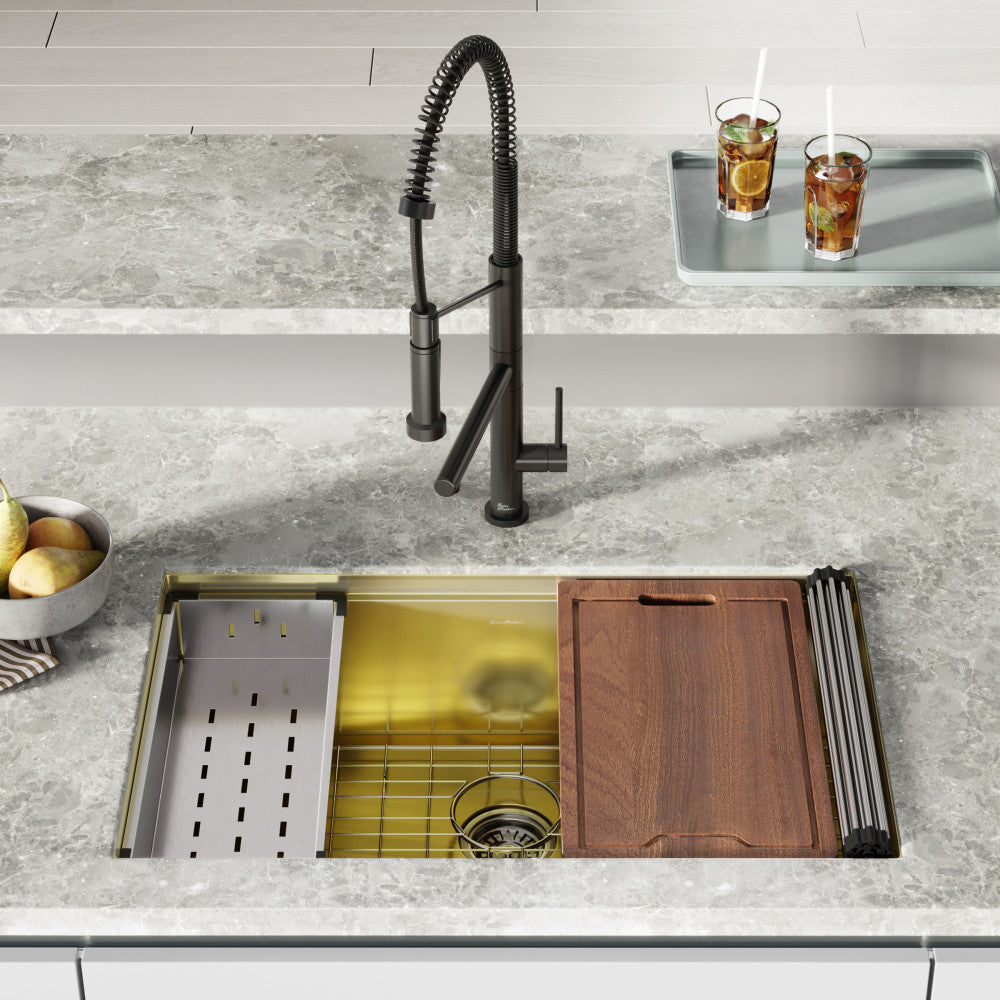 18 gauge polished gold stainless steel undermount kitchen sink with accessories and grid.