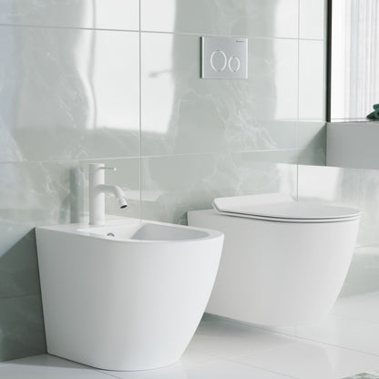 Single-handle bidet faucet in matte white with sleek modern design.