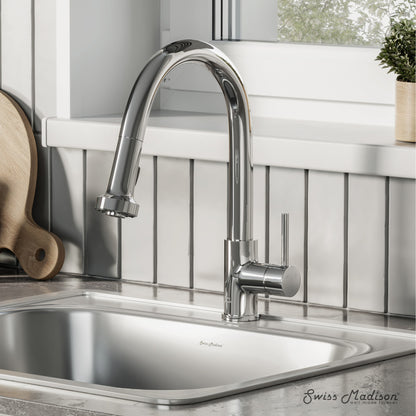 Single handle pull-down kitchen faucet in chrome with curved spout and side lever handle.