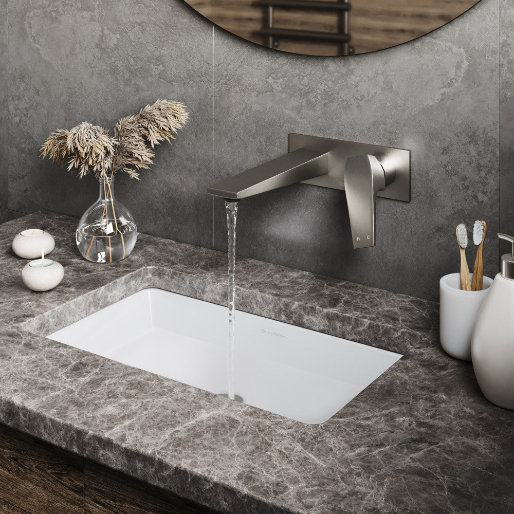 Single-handle wall-mount bathroom faucet in brushed nickel with a sleek modern design.