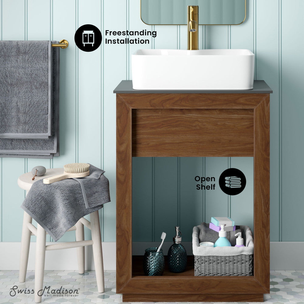 24-inch freestanding walnut wood bathroom vanity with slate countertop, open shelf, and white vessel sink.