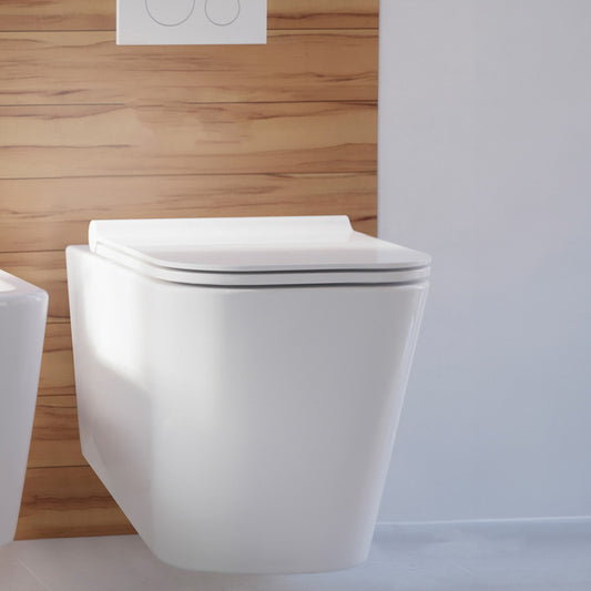 Wall-hung square toilet bowl with soft-close seat, sleek modern design, white ceramic finish.