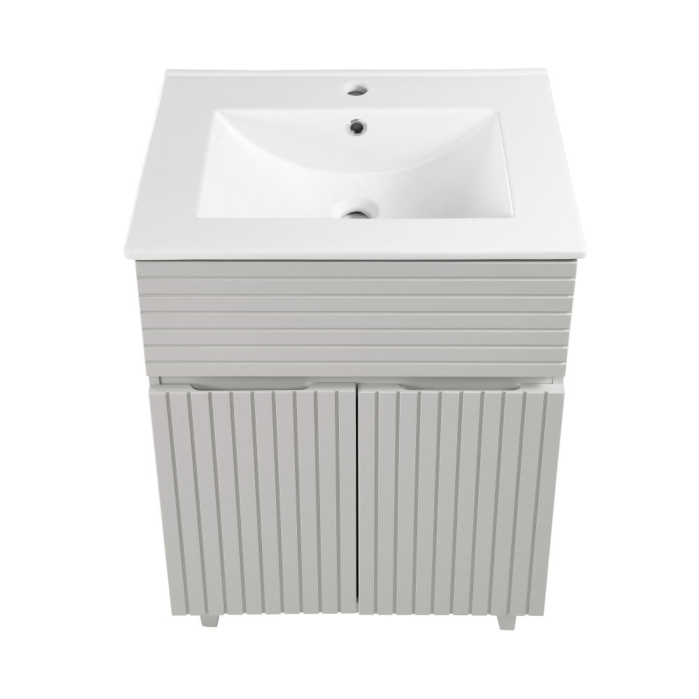 24-inch freestanding bathroom vanity in shell color, single sink, soft-close doors.