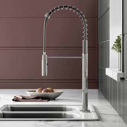 Single handle pull-down kitchen faucet in brushed nickel, flexible coil spring spout.