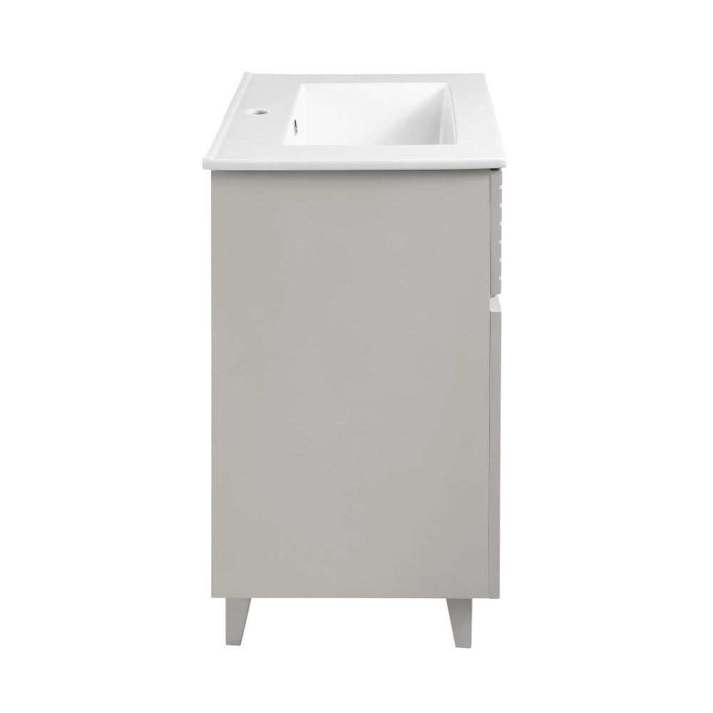 24-inch shell freestanding bathroom vanity with single integrated sink and smooth flat-front design.