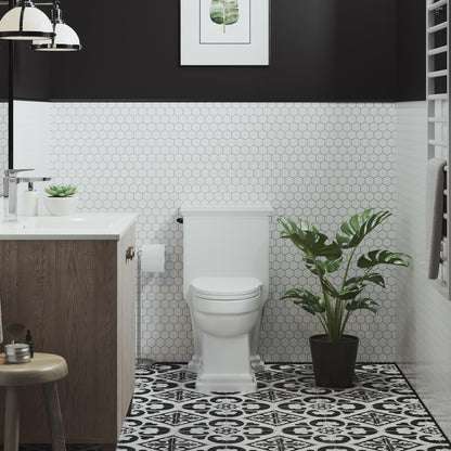 Elongated one-piece toilet with side flush lever, white porcelain, traditional design.