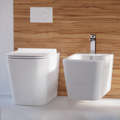 Wall-hung Concorde bidet in white ceramic with chrome faucet, modern minimalist design.