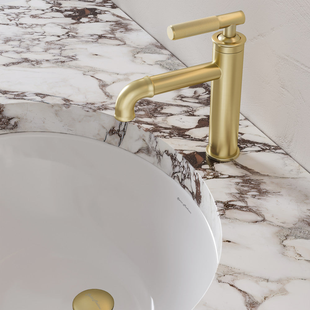 Single-handle bathroom faucet in brushed gold, sleek design.