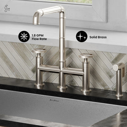 Widespread kitchen faucet in brushed nickel with high arc spout and side sprayer, solid brass construction.