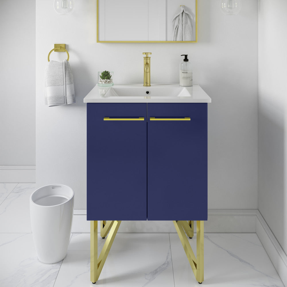 24-inch freestanding navy blue bathroom vanity with gold legs, gold handles, white sink top, and gold faucet.