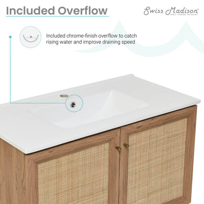 36-inch wall-mounted oak bathroom vanity with single white integrated sink and soft-close doors.