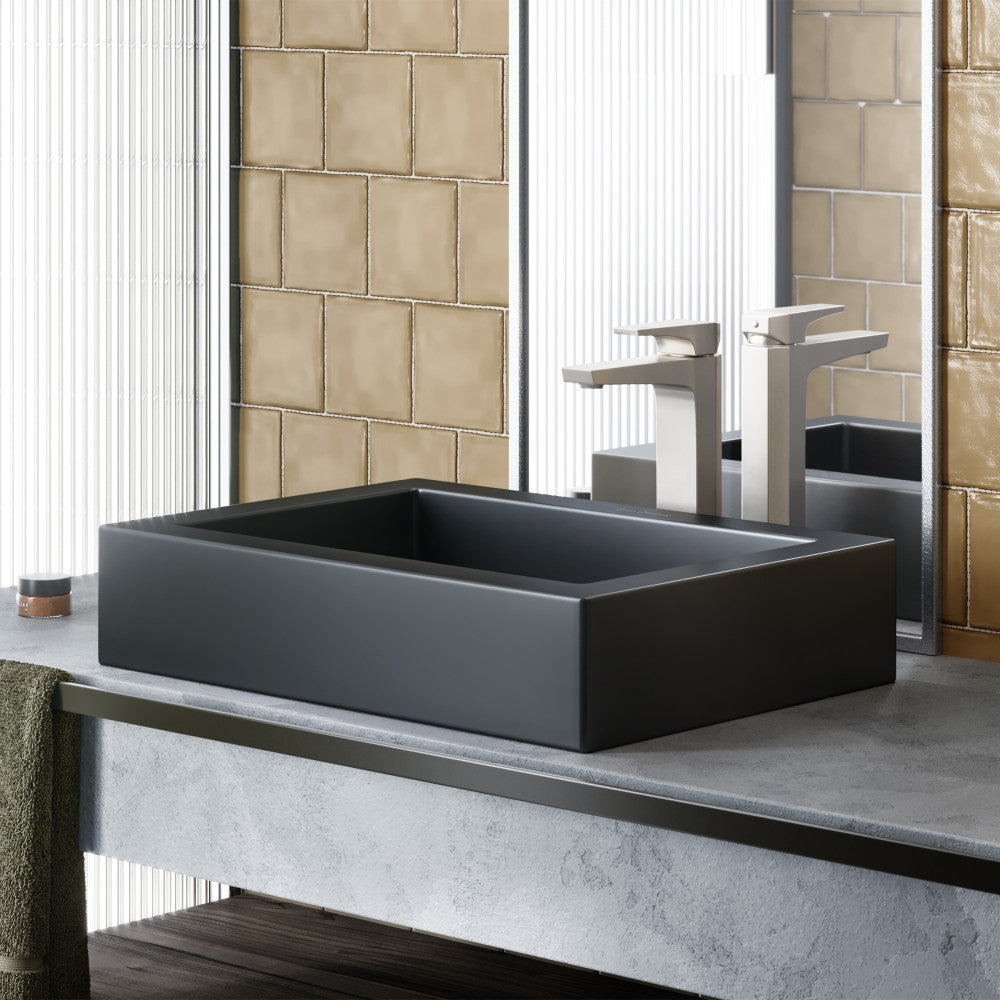 Matte black rectangular ceramic vessel sink, flat edges, modern minimalist design.