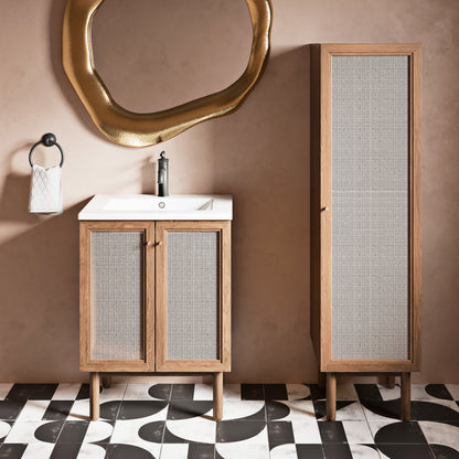15.5x15x60-inch freestanding linen cabinet in Toppan Oak with woven front panels, matching vanity with white sink.