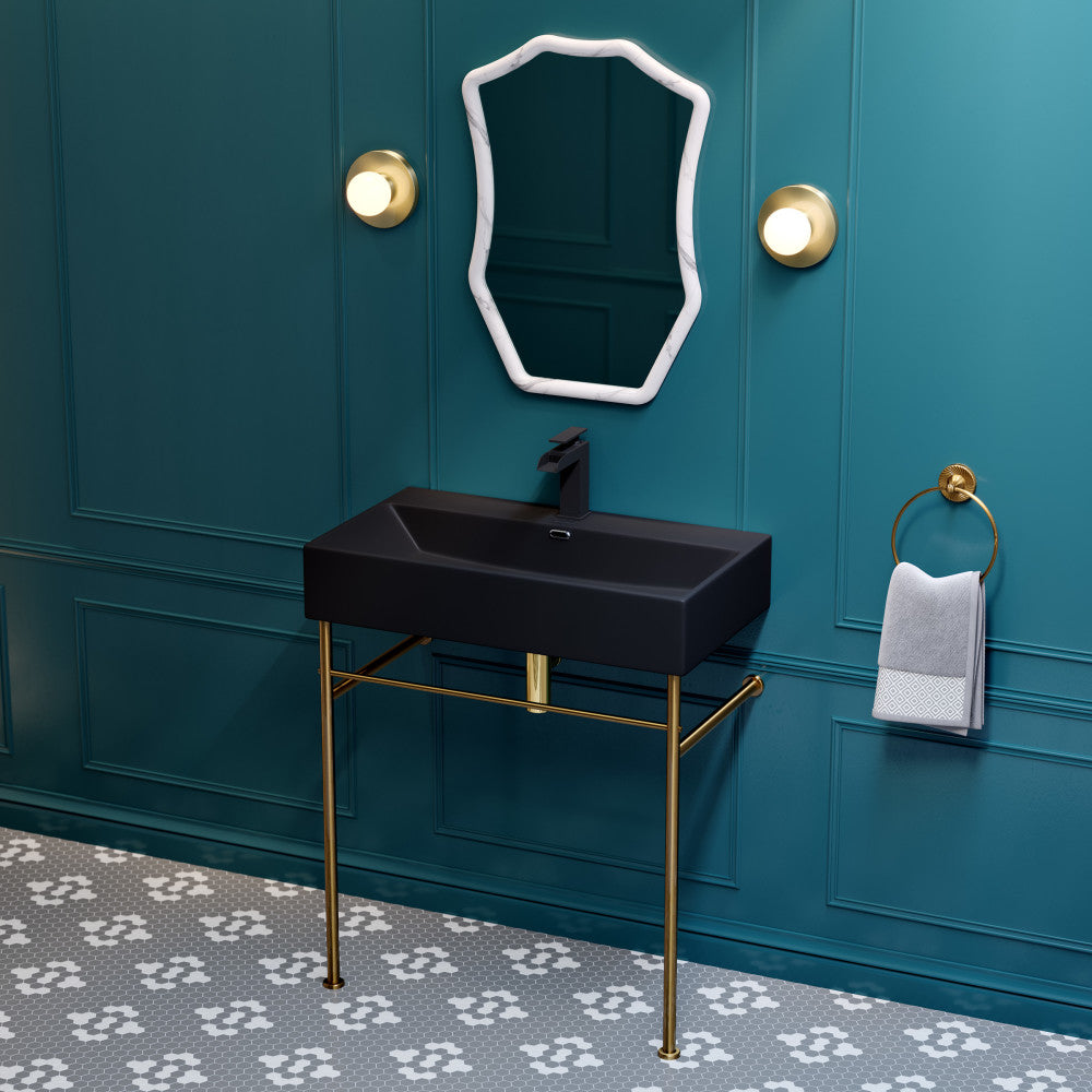 30-inch ceramic console sink in matte black with brushed gold legs, rectangular basin, and wall-mounted faucet.