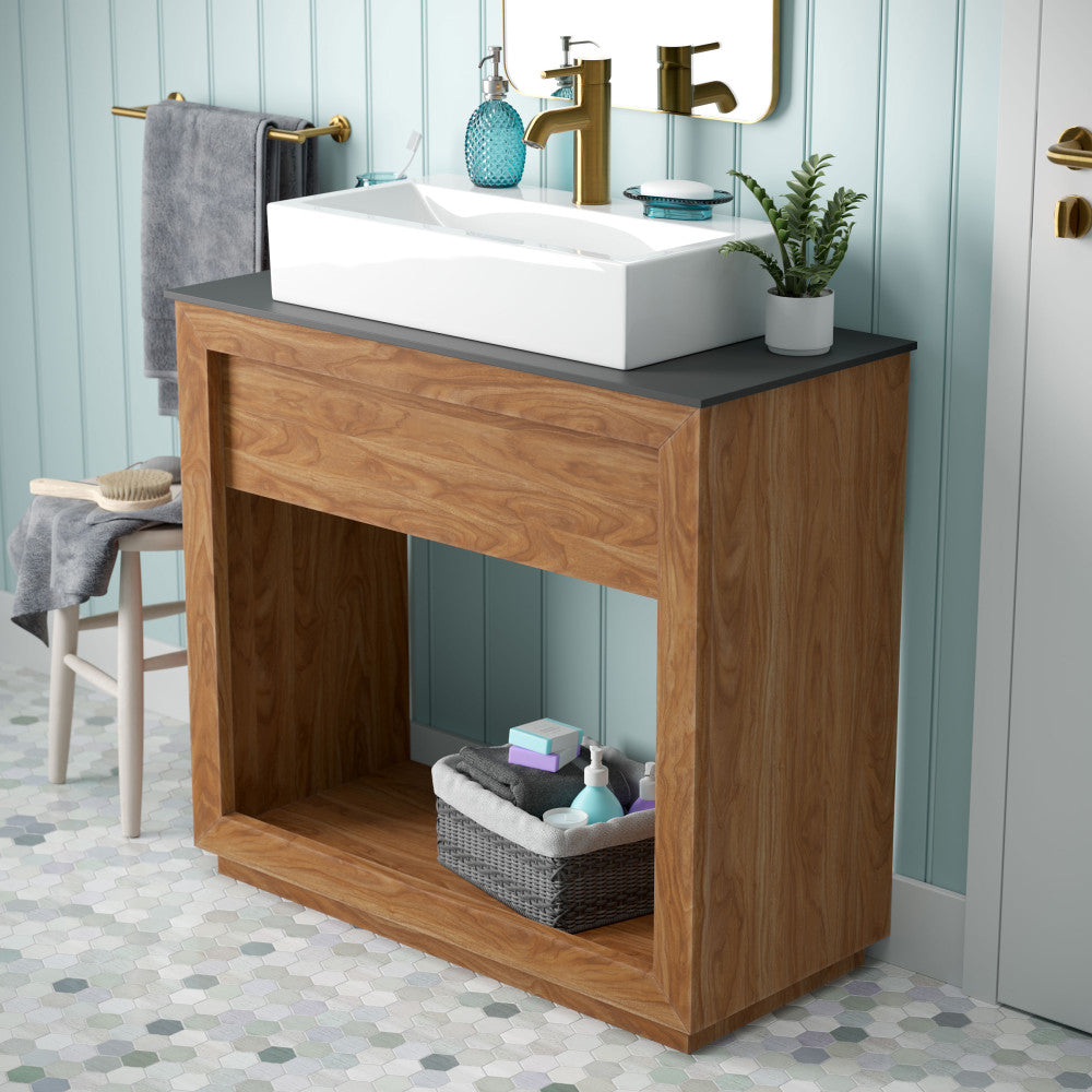 36-inch freestanding bathroom vanity in natural teak with single sink and black countertop.