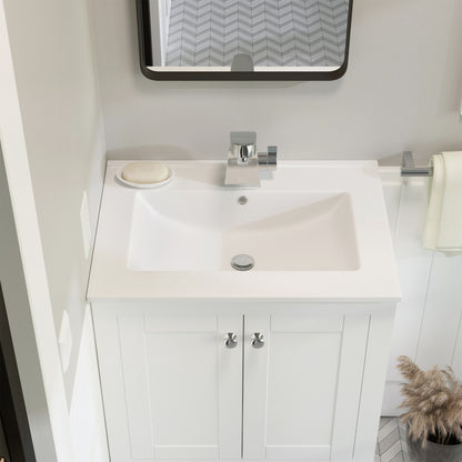 24-inch white ceramic vanity top with single faucet hole and integrated rectangular sink.