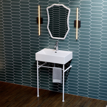 White ceramic rectangular console sink with matte white metal legs and single faucet hole.