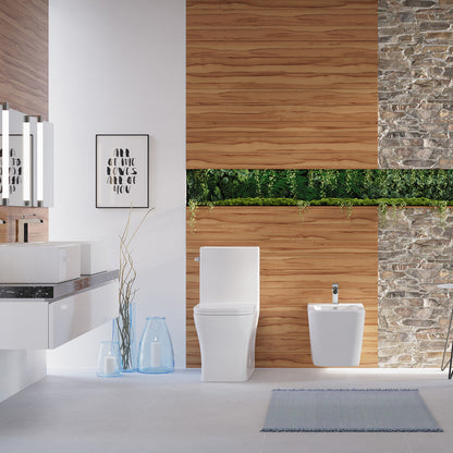 Elongated one-piece white toilet with left-hand flush in modern bathroom setting.