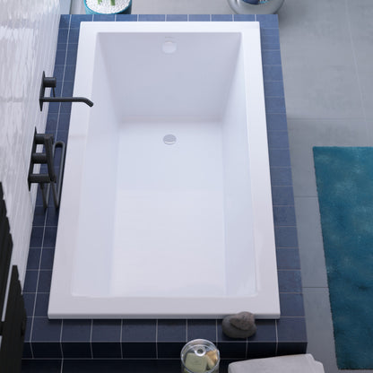Drop-in rectangular white bathtub 72 by 36 inch, reversible drain.