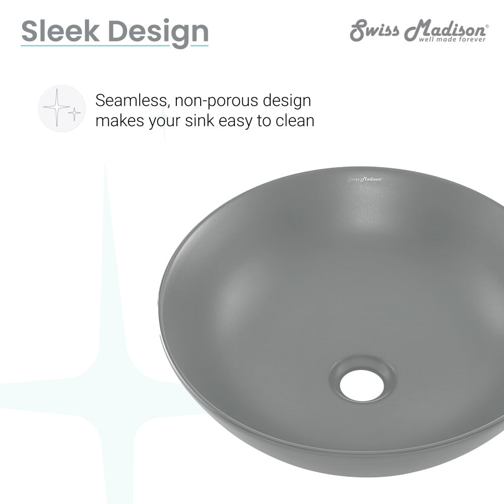 Matte gray round vessel ceramic sink, seamless design with center drain hole.