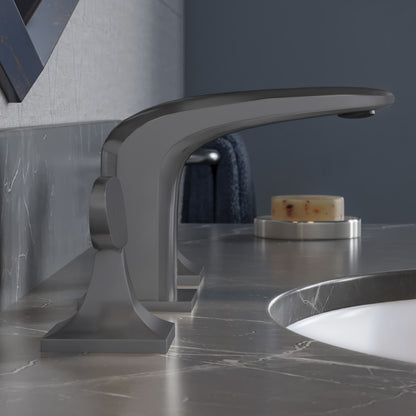 Widespread bathroom faucet in gunmetal gray with two handles and a curved spout.