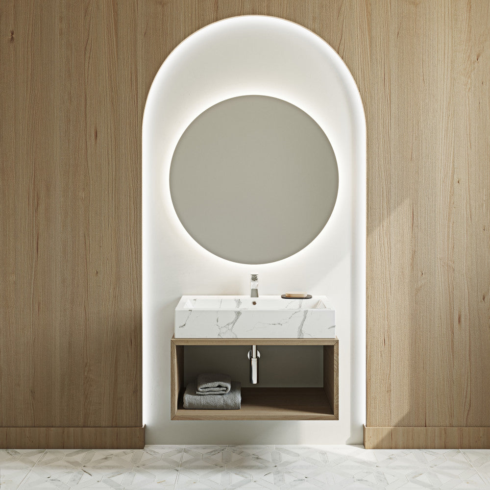 White marble wide rectangle vessel sink with polished edges, mounted above floating wooden vanity.