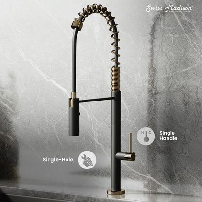 Pull-down kitchen faucet in brushed gold and black, single handle, single-hole mount.