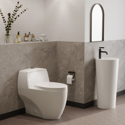 Elongated one-piece toilet in white, dual-flush with soft-close seat, modern bathroom setting.