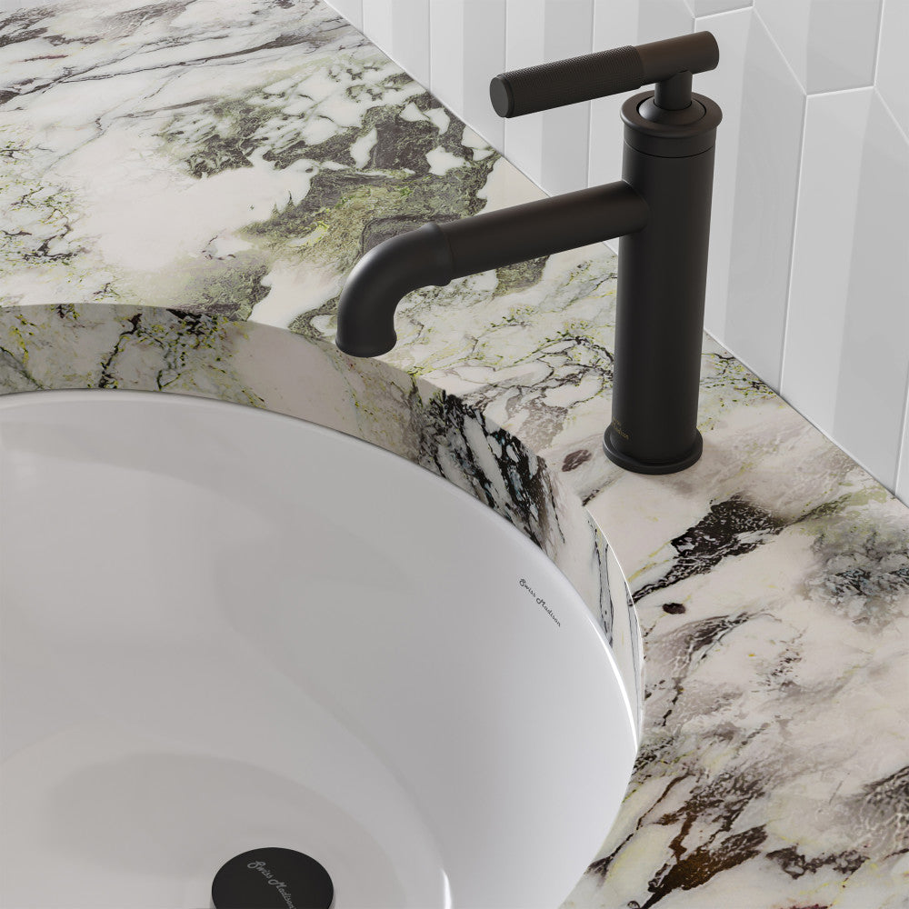 Single-handle bathroom faucet in matte black, sleek cylindrical design, spout with rounded tip.