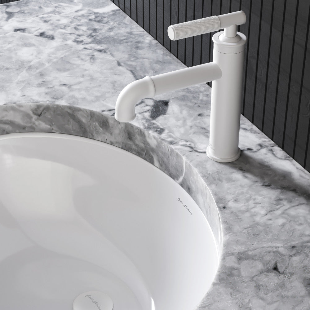 Single-handle bathroom faucet in matte white with a sleek, minimalist design.