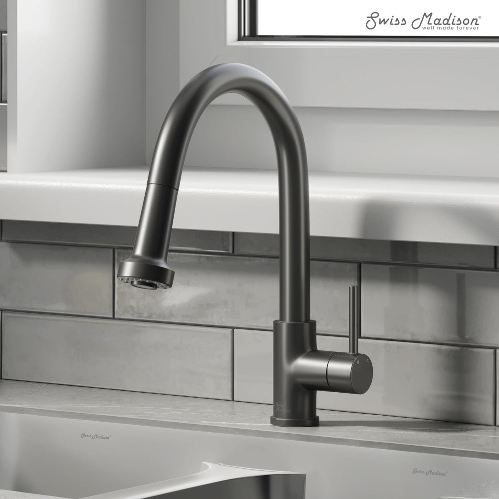 Single handle pull-down kitchen faucet in matte black with curved spout and side lever handle.
