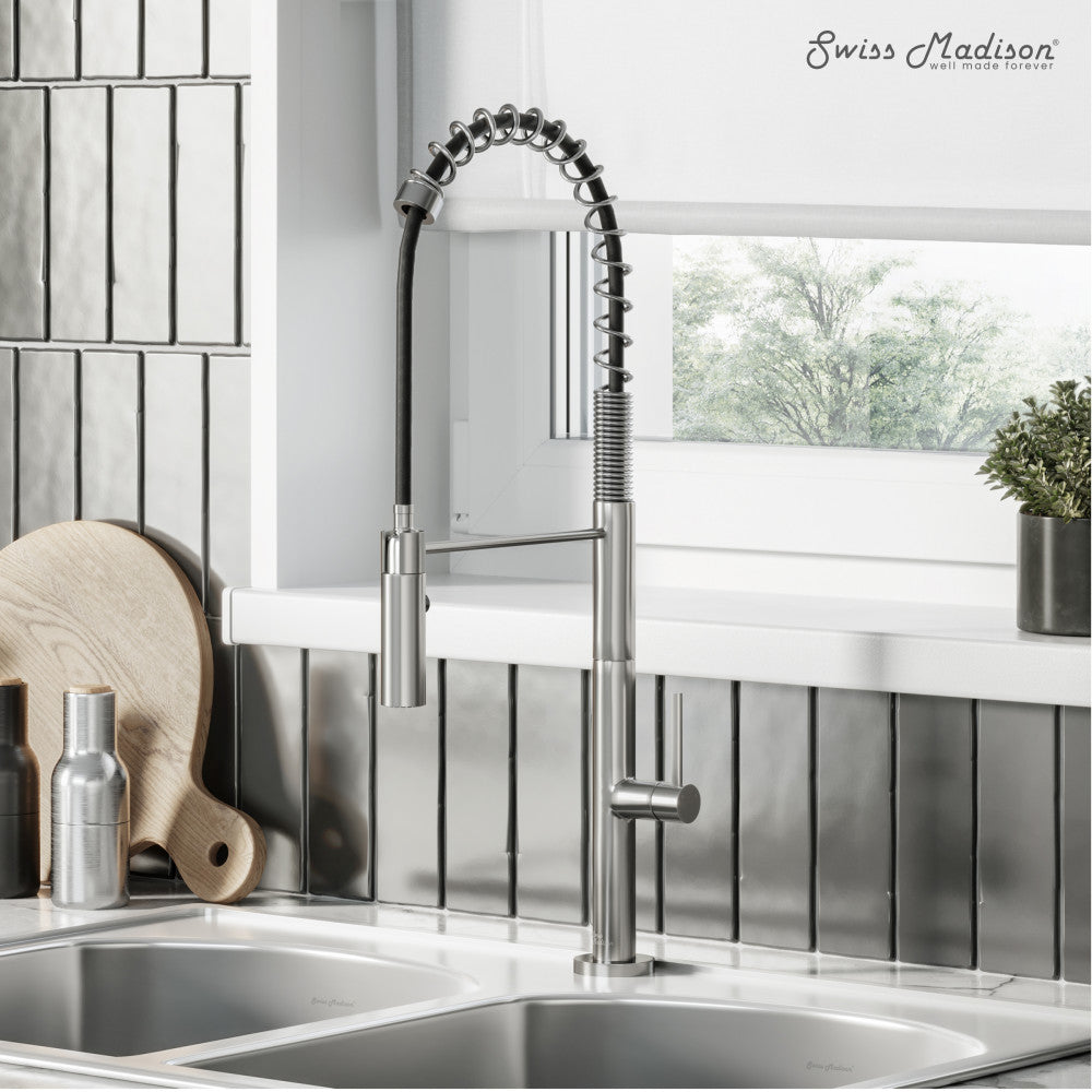 Single handle pull-down kitchen faucet in brushed nickel with high-arc spring spout.