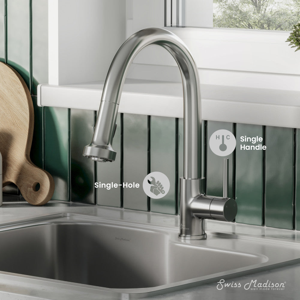 Single-handle pull-down kitchen faucet in brushed nickel with curved spout and spray head.