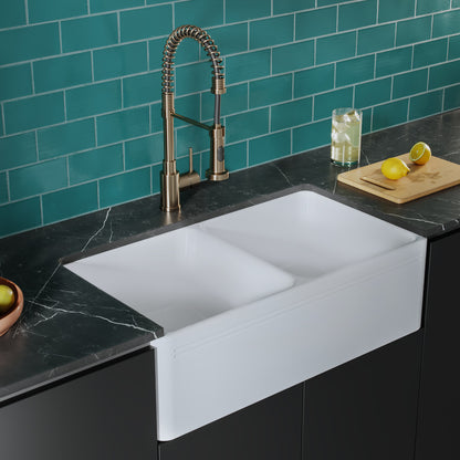 34-inch double basin ceramic farmhouse kitchen sink in glossy white with apron front.