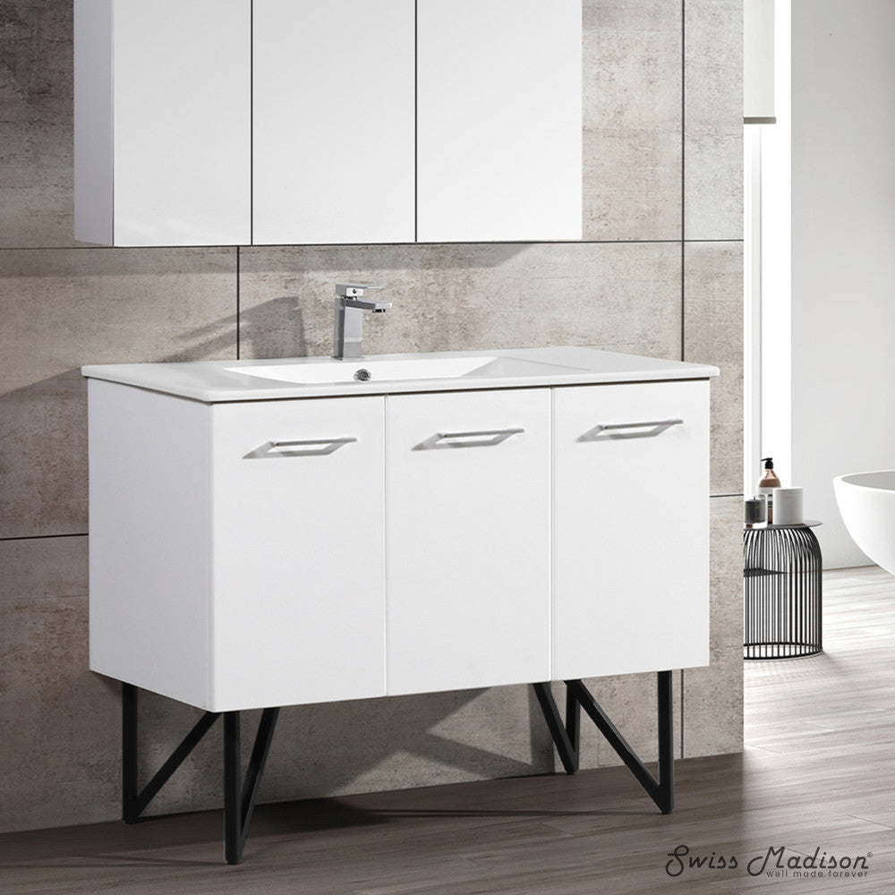 48-inch freestanding white bathroom vanity with single sink and soft-close doors.