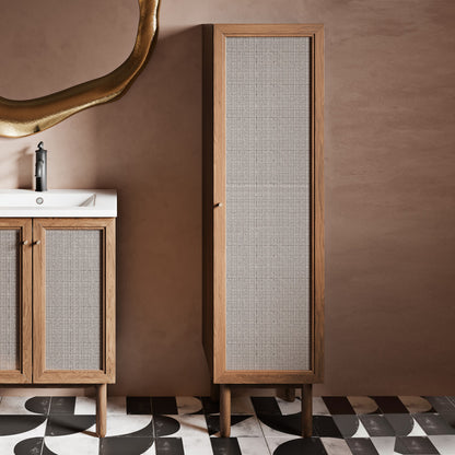 15.5x15x60-inch freestanding linen cabinet in Toppan oak with fabric-textured door panel, modern design.