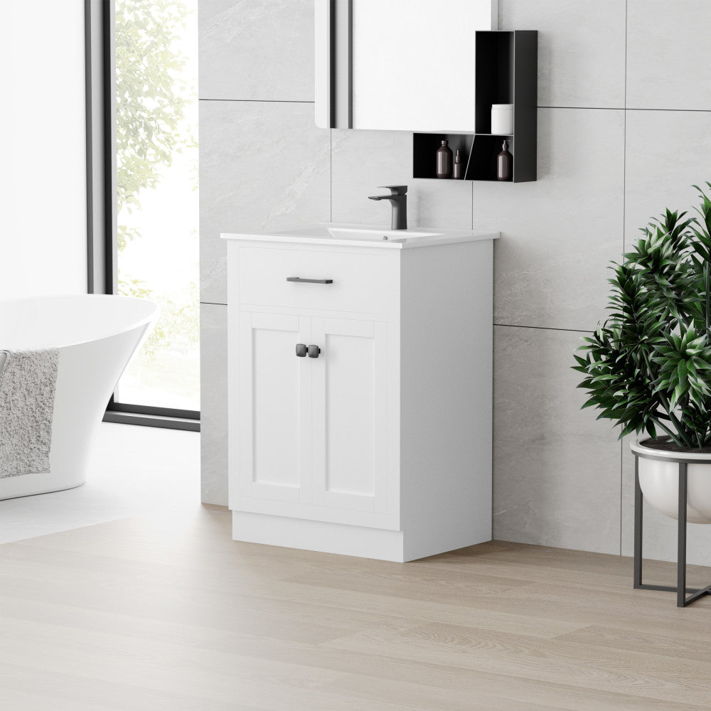 24-inch freestanding white bathroom vanity, single sink, soft-close doors.
