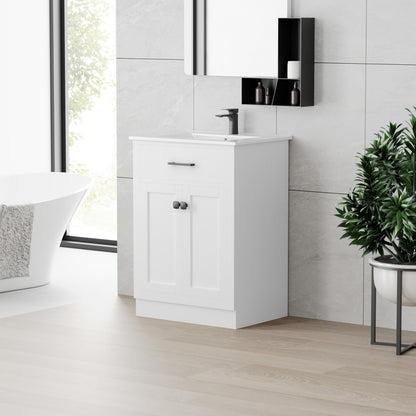 24-inch freestanding white bathroom vanity, single sink, soft-close doors.